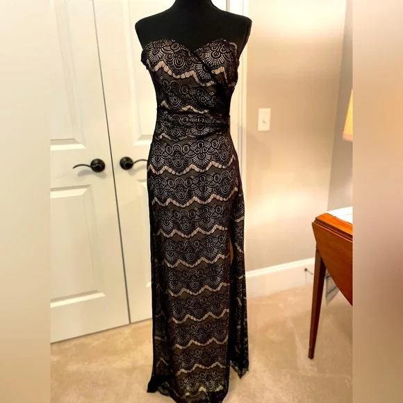 BeBe strapless full-length sheath dress with side slit.